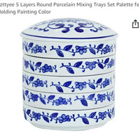 Custom porcelain stacking dishes. Filled with watercolor